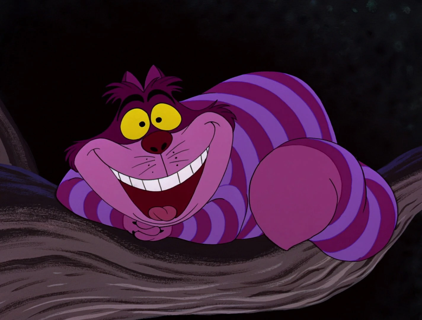 Cheshire Cat smiling on a tree branch