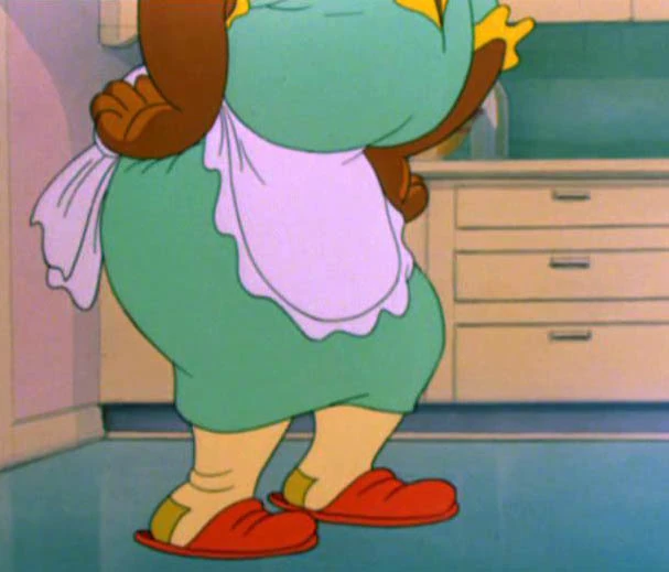 Mammy Two Shoes from Tom and Jerry standing in a room